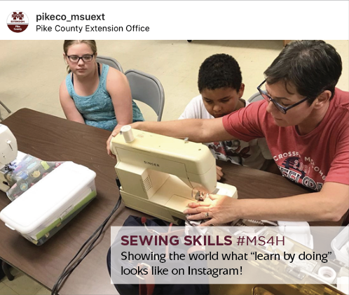 A Facebook post showing two children watching one adult adjust a sewing machine.