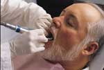 image of a senior citizen getting dental work