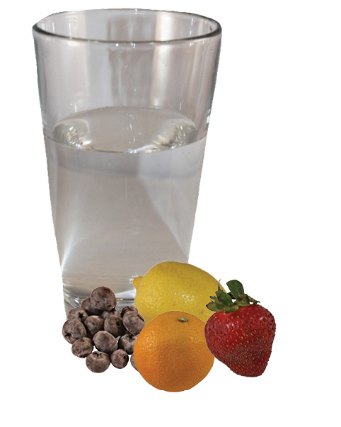 A glass of water, a bunch of grapes, an orange, a lemon, and a strawberry.