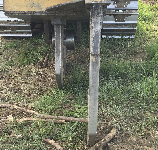 Close-up of large metal diggers.