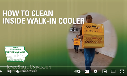 Screen capture from a video titled "How to clean inside walk-in cooler."