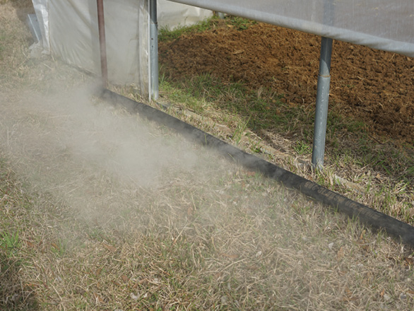 A long nylon tube stretched along the ground.