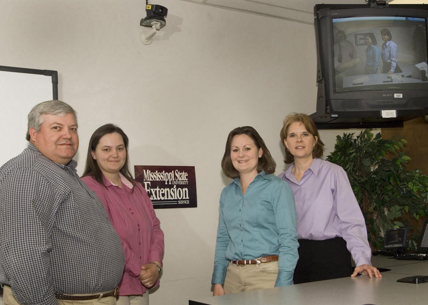 The MSU Extension Service distance education program team members include (from left) Steve Hankins, Susan Fulgham, Jane Parish and Susan Seal. (Photo by Marco Nicovich) See larger view.