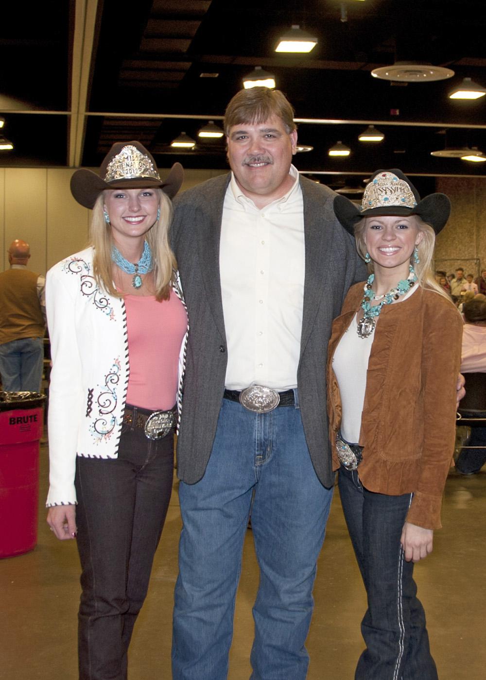 Miss Dixie National Paige Nicholson and Miss Mississippi Rodeo Samantha Golden joined Mississippi State University Extension Service director Gary Jackson at the 2012 Dixie National Sale of Junior Champions to support youth development and agriculture. (Photo by Kat Lawrence)