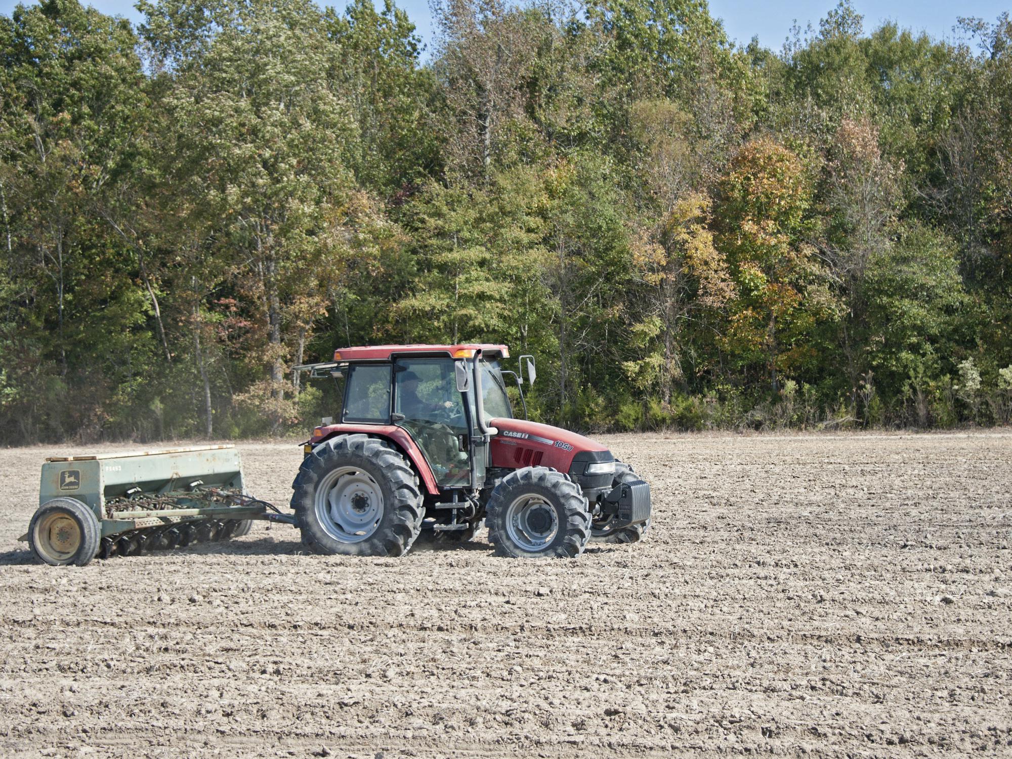 Wheat acreage is expected to be down this year, but about half of the state's expected crop had been planted by early November. Blake Garrard was planting wheat Nov. 4, 2014, at the Mississippi State University Rodney Foil Plant Science Research Center in Starkville. (Photo by MSU Ag Communications/Kat Lawrence)