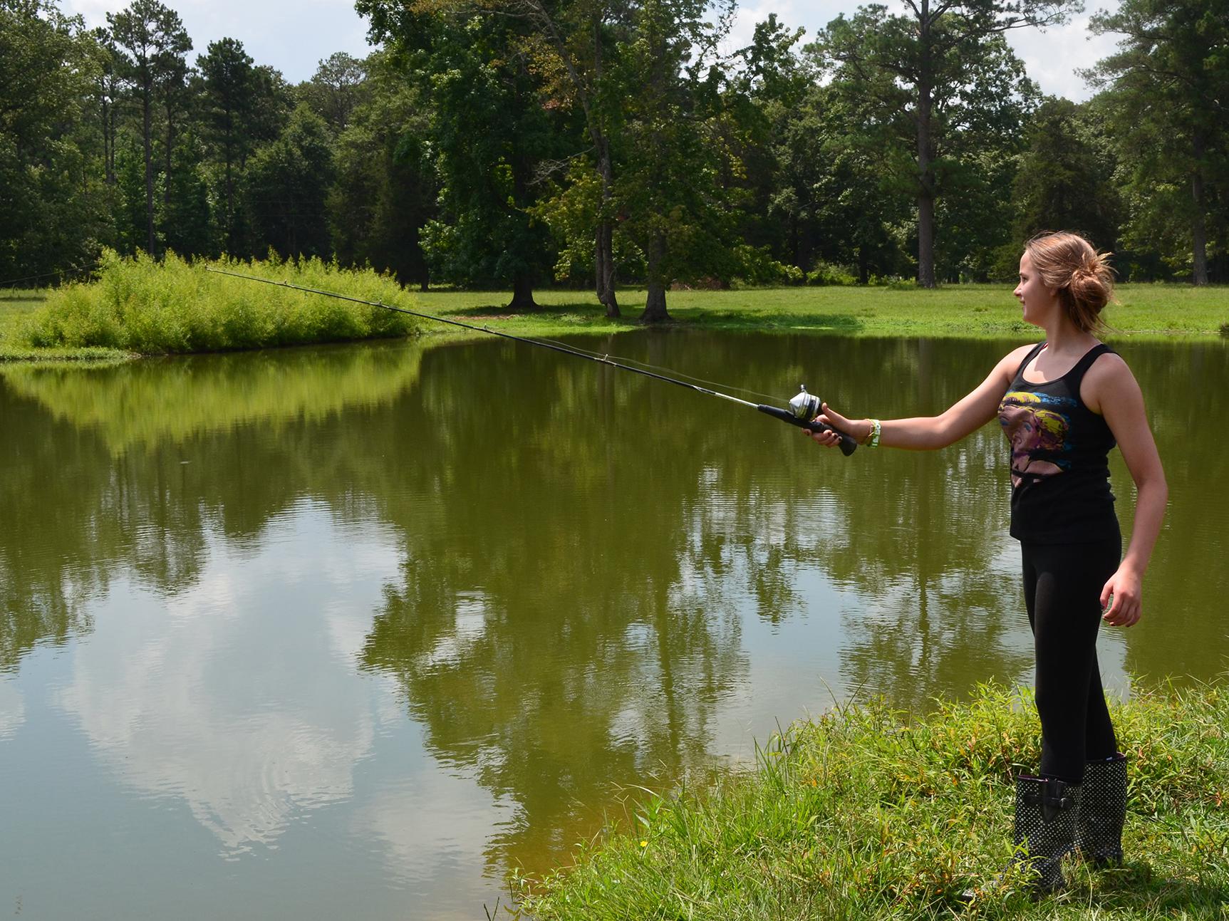 With proper stocking ratios and active management, small ponds can provide fun fishing opportunities and food for the table. (File photo by MSU Extension Service/Linda Breazeale)