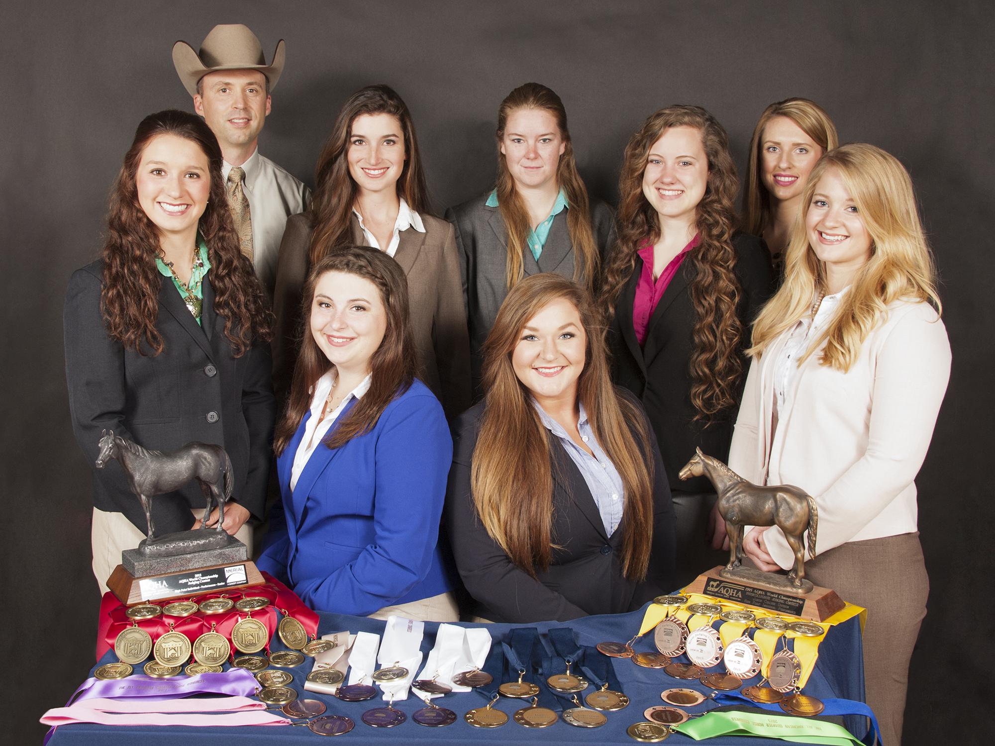 Mississippi State University’s award-winning horse judging team includes (front row, from left) Hannah Collins of Pontotoc; Ashley Greene of Jacksonville, Florida; Carlee West of Brooklyn; Samantha Miller of Birmingham; and (back row, from left) Clay Cavinder, team coach; Hannah Miller of Starkville; Ashley Palmer of Jackson; MaeLena Apperson of Mocksville, North Carolina; and Emily Ferjak, graduate student and assistant coach, from Killingworth, Connecticut. (Photo by MSU Extension Service/Kat Lawrence)