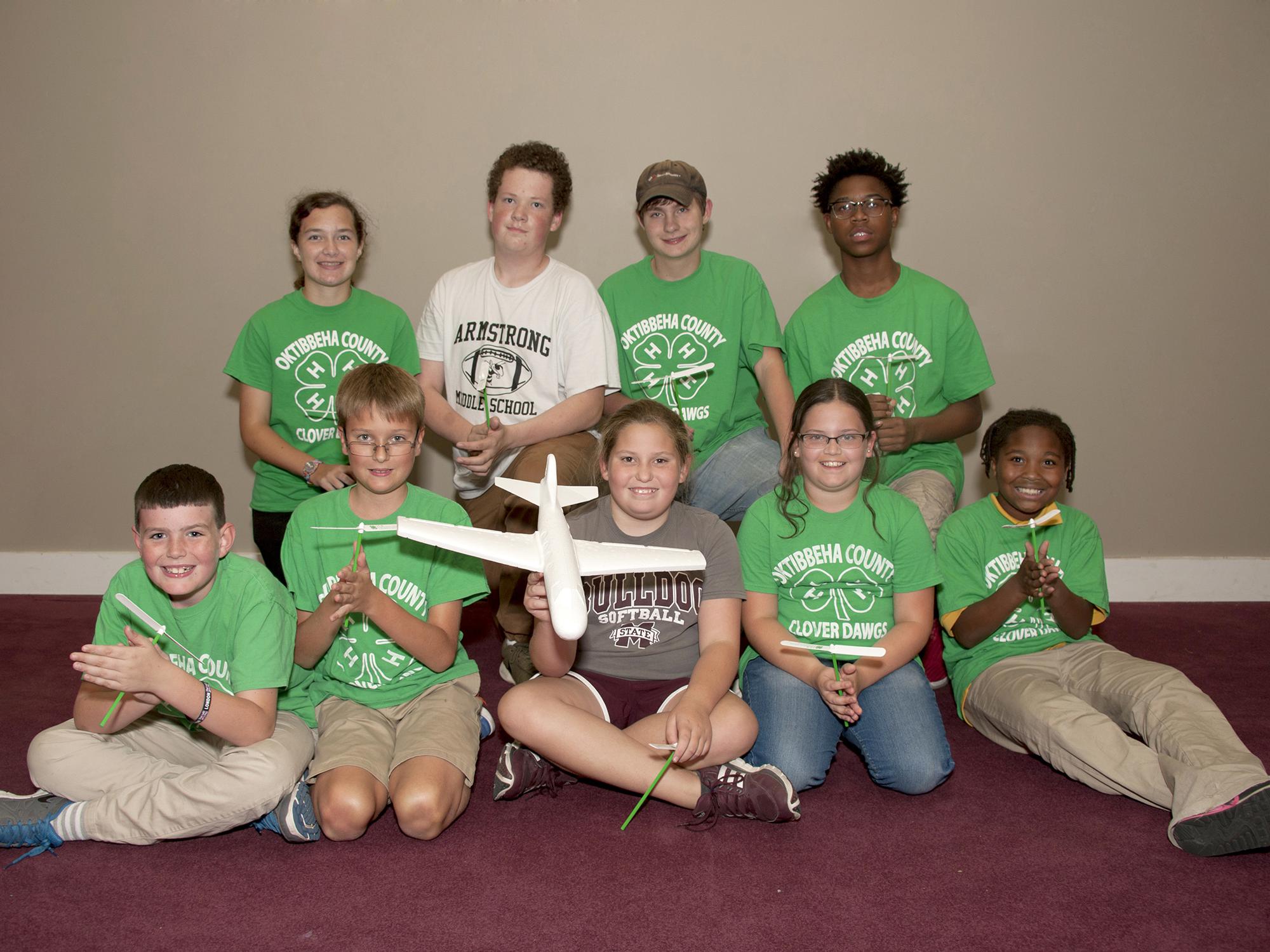 Mississippi 4-H’ers in the Oktibbeha County Clover Dawgs robotics engineering club celebrate 4-H National Youth Science Day. The Oct. 5 event features an engineering challenge for young people. (Photo by MSU Extension Service/Kat Lawrence)