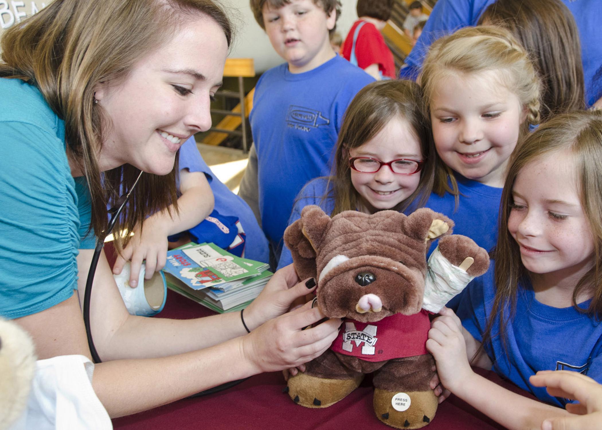 Pre-registered school groups will attend the Mississippi State University College of Veterinary Open House on April 5. Students, such as these at the 2012 event, enjoy the hands-on activities and demonstrations. (Photo by MSU College of Veterinary Medicine/Tom Thompson)