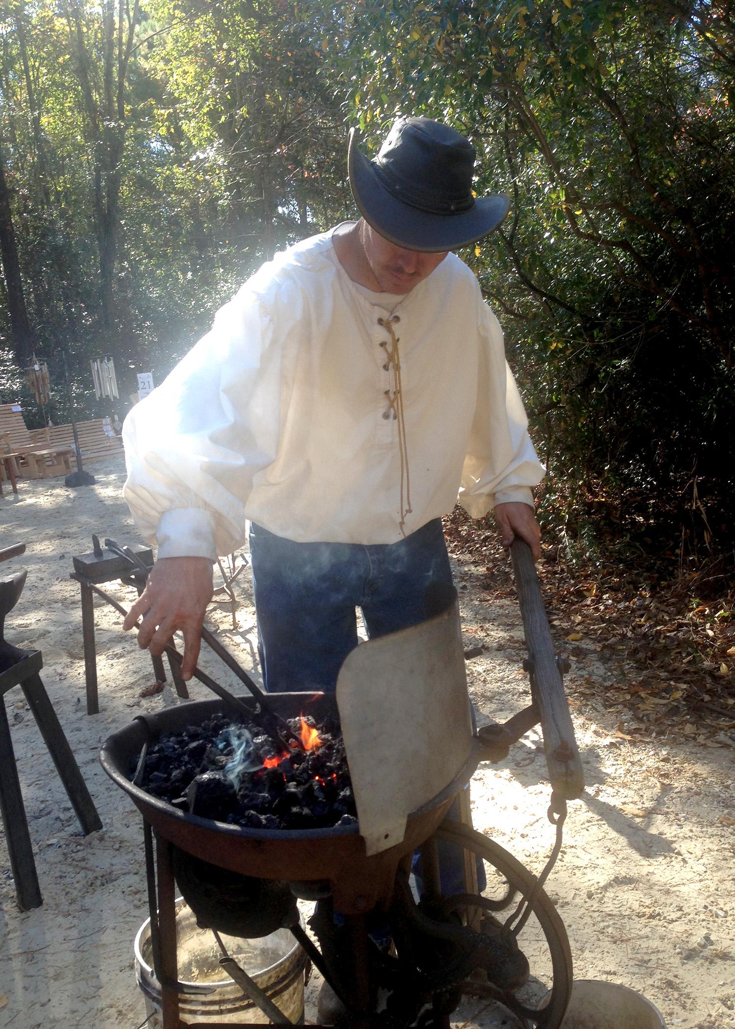 Blacksmith Chuck Averett demonstrates his skill on an authentic 1860s forge during last year's Forge Day at the MSU Crosby Arboretum in Picayune. The 2015 Forge Day is set for Jan. 31 from 10 a.m. to 2 p.m. (Photo by MSU Extension Service/Pat Drackett)