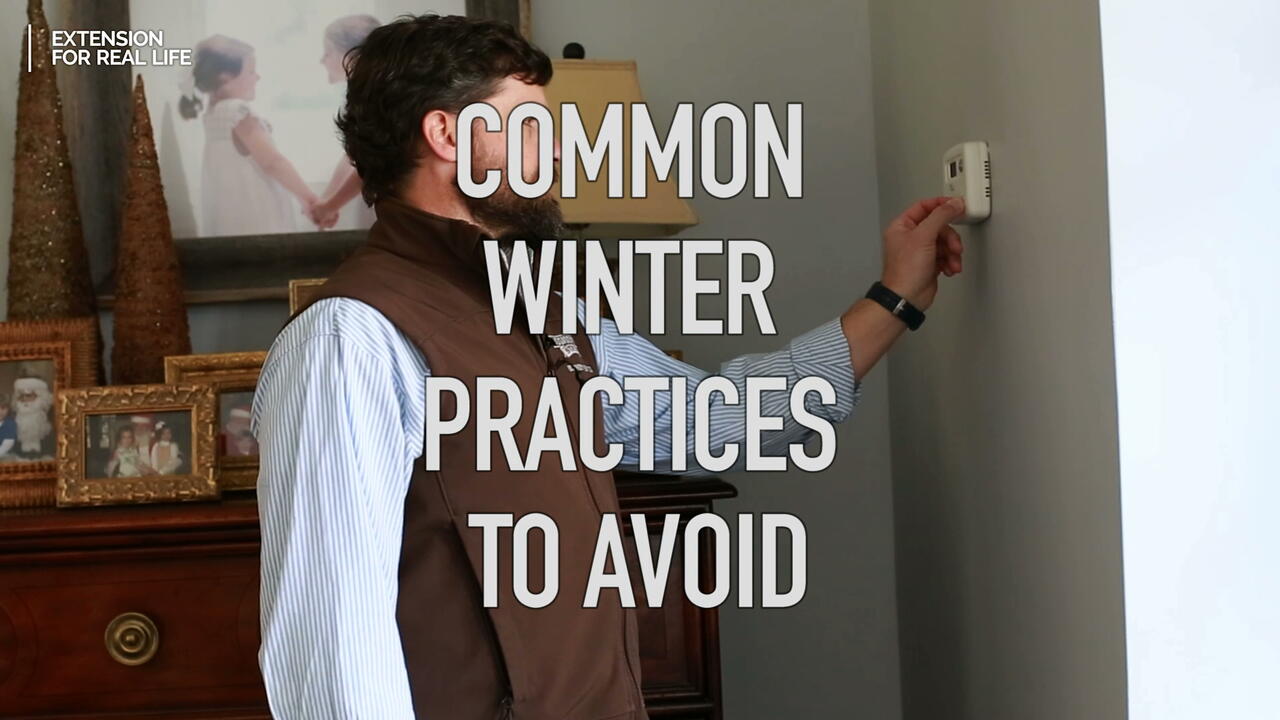 Common Winter Practices to Avoid superimposed over man adjusting thermostat