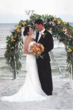 Maci and Graham Flautt, who now reside in Sumner, Miss., chose a beach location for their Sept. 5, 2004, wedding in Gulf Shores, Ala. This wedding destination offered the couple all the special details of a traditional wedding, but in an untraditional setting. (Photo used with permission)