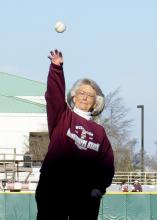 Bearden throws out the first pitch at the MSU baseball game February 26. She was honored for 50 years of service during MSU’s 132nd birthday celebration. (Photo by Scott Corey)
