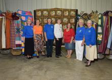 Quilters from the Mississippi Homemaker Volunteers of Covington County, from left,Carolyn Williamson, Martha Douglas, Wanda Hall, Doris Sullivan, Connita Weber, Mary Sokovich and Jo Bucklew, spent months creating quilts for wounded veterans who arrived for the Hot Coffee Hunts for Heroes on Dec. 12, 2014. (Photo by MSU Ag Communications/Kevin Hudson)