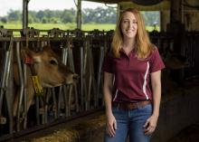 Amanda Stone, dairy specialist with the Mississippi State University Extension Service, studies the herd at the MSU Bearden Dairy Unit and brings the latest research-based information to the state’s dairy producers. (Photo by MSU Extension Service/Kevin Hudson)