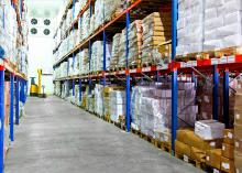 Frozen food at shelves in cold warehouse