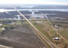 Parts of the Mississippi River have been flooding since January. The Greenville gauge reading of 56.2 feet set a record for the month. Widespread flooding can be seen looking west in this aerial photo taken Jan. 10, 2016, of the Mississippi River bridge at Greenville. (Submitted Photo by Mississippi Levee Board/Peter Nimrod)