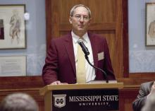 Dr. Richard Hopper, professor at the Mississippi State University College of Veterinary Medicine, thanks contributing authors and his family at an event hosted by the MSU Mitchell Memorial Library to celebrate the publication of his book, "Bovine Reproduction." (Submitted Photo)