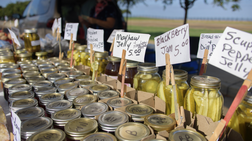 Canned goods at a farmers market.
