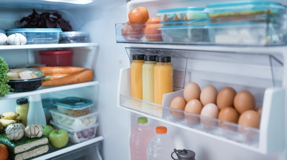 Fridge with food in it.