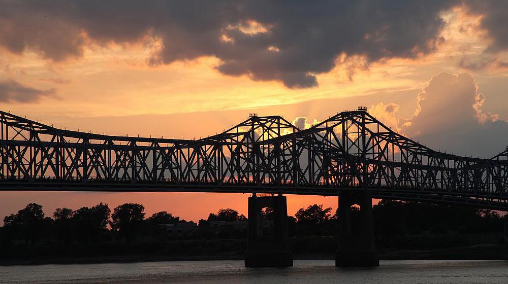 A sunset behind the Mississippi River Bridge at Natchez, Mississippi.