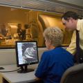 Sandy Brown, CVM Technical Supervisor, and Ryan Butler, CVM 2007 graduate, view an image during clinical scanning.