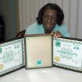 Longtime Warren County 4-H club leader Gloria Smith displays certificates she received from the state 4-H program and the Mississippi Volunteer Leaders Association for her service to youth. (Photo by Patti Drapala)