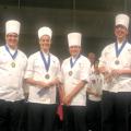 The Jackson County 4-H team of chefs from St. Martin High School (from left), Cory Martin, Sarah Soares, Adriana Wilson, and Jarod Harris, were named grand champions of the first-ever Southern Regional 4-H Seafood Cook-Off, held in conjunction with the Great American Seafood Cook-Off in New Orleans. (Submitted photo.)