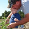 Mike Steede, pictured with his nephew Gunter, and his family operate a community supported agriculture program on land their family has farmed for over a century.