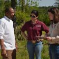 Winston County farmer Willie Lee Jr. discusses his losses from the April 28 tornado with Mississippi State University Extension Service disaster assessment team members Brandi Karisch (center) and Jane Parish, both of MSU's Department of Animal and Dairy Sciences. (Photo by MSU Ag Communications/Linda Breazeale)