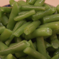 Freshly blanched green beans in a bowl.
