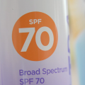 A can of Broad Spectrum SPF 70 sunscreen.