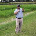 Bobby Golden, a rice and soil fertility agronomist with the Mississippi State University Extension Service, speaks to attendees of the MSU Delta Research and Extension Center Rice Producer Field Day in Stoneville, Mississippi, on Aug. 2, 2017. (Photo by MSU Extension Service/Kenner Patton)