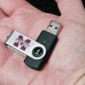 A USB (universal serial bus) flash drive is a small device that fits in a palm. It allows for the rapid transfer of data from the computer to the flash drive and from the flash drive to the computer. A 4GB USB flash drive costs less than $10.  (Photo by Scott Corey)