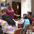 Dannie Bolden, Wilkinson County nutrition educator with the Mississippi State University Extension Service, speaks to participants of the wellness event about reducing fat and sugars in their diets in Natchez, Mississippi, on Aug. 9, 2016. (Photo by MSU Extension Service/Kevin Hudson)