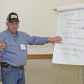 Dale Weaver of Noxubee County leads the grain crops discussion at the Producer Advisory Council meeting in Verona, Mississippi, on Feb. 16, 2017. Mississippi State University Extension Service and the Mississippi Agricultural and Forestry Experiment Station host the annual meeting. (Photo by MSU Extension Service/Kevin Hudson)