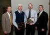 Two Mississippi State University agricultural division employees were recently honored for service and career achievement. From left are award sponsor representative Michael Barnes of Southern Ag Credit; Peter Ryan, recipient of the 2009 MAFES Excellence in Research Award; John Anderson, recipient of the 2009 Outstanding Extension Worker Award; and award sponsor representative Bill Cook of the Land Bank of North Mississippi. (Photo by Scott Corey)