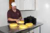 Butch Smith prepares to package cheese produced from Jersey cow milk on his family farm. (Photo by Kat Lawrence)