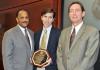 The Mississippi Board of Trustees of the State Institutions of Higher Learning recently presented Dr. Mark Lawrence with the Black History Month Educator of the Year award for Mississippi State University's Division of Agriculture, Forestry and Veterinary Medicine. Pictured: Trustee Bob Owen, co-chair of the Diversity Committee, Lawrence and Greg Bohach, DAVFM vice-president. (Submitted Photo)