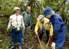 Mississippi Master Naturalist Alice Butler, program director Chris Boyd, Master Naturalist David Butler, and Master Naturalist Carole McRight help during a 2009 cleanup day at the Biloxi High School Nature Trail. The Master Naturalist Program is one of many volunteer programs that offers citizens training and certification in exchange for service hours returned to the community. (MSU Ag Communications/file photo)