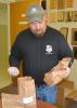 Mississippi State University Extension Service cotton specialist Darrin Dodds examines on April 3, 2014, cotton seeds he will use in seed treatment research trials on the R.R. Foil Plant Science Research Center in Starkville, Miss. (Photo by MSU Ag Communications/Linda Breazeale)