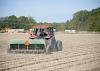 Wheat acreage is expected to be up from last year, but the ground across most of the state was too dry to plant through October. Blake Garrard is shown planting wheat last fall at the Mississippi State University Rodney Foil Plant Science Research Center in Starkville. (File photo by MSU Extension/Kat Lawrence)