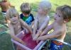 To avoid sunburn, young children should wear sunscreen and stay in the shade as much as possible when playing outside. (Photo by MSU Extension/Alexandra Woolbright)