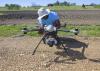 David Young, a flight coordinator with the Geosystems Research Institute at Mississippi State University, prepares an unmanned aircraft to fly over test plots at the H. H. Leveck Animal Research Center April 7, 2016. (Photo by MSU Extension/Kevin Hudson)