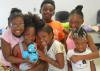 Campers (front row, from left) Jendiya Harkins, Jayda Robson, Ankeria Harkins and Morgan Peterson; and Travis Jones and Ceniyah Jamison learn robotics at a community summer camp on July 11, 2016 in Artesia, Miss. The Mississippi State University Extension Service and 4-H uses robotics to introduce children to science, technology, engineering and mathematics programs at an early age. (Photo by MSU Extension Service/Michaela Parker)