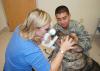 Dr. Caroline Betbeze with the Mississippi State University College of Veterinary Medicine examines a canine patient as part of the American College of Veterinary Ophthalmologists/Merial National Service Dog Eye Exam event. (Photo Submitted)