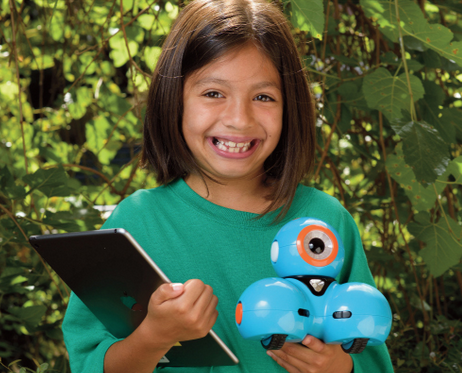 A 4-H Cloverbud holding a tablet and robot.