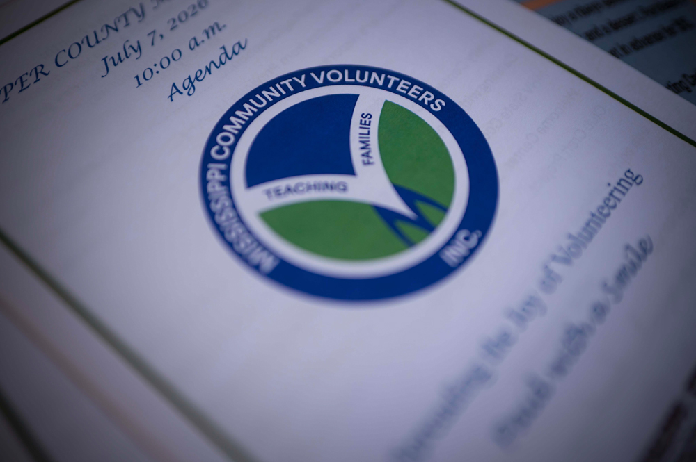 Mississippi Community Volunteers logo shown on an agenda.