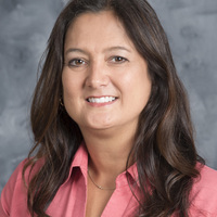 Dr. Carla L. Huston