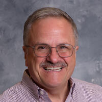 Dr. James M. DelPrince